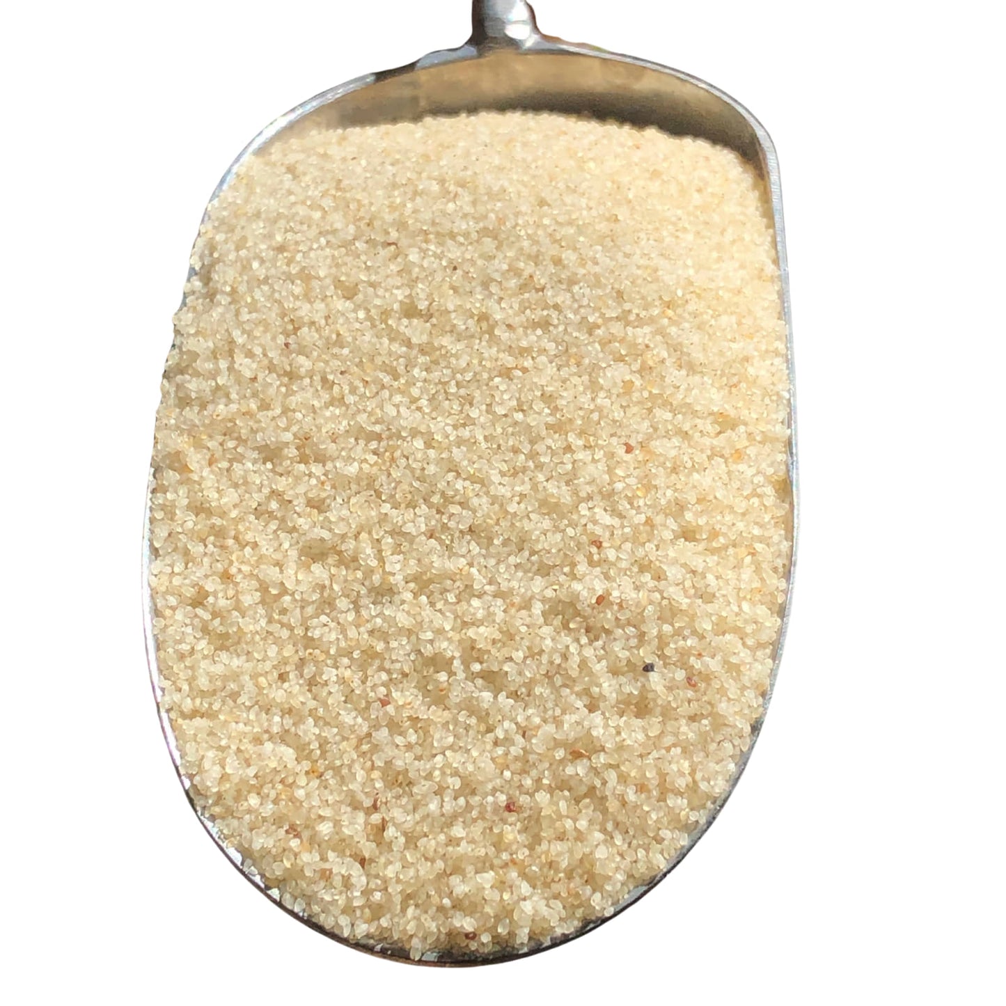 Metal scoop filled with fonio on a white background