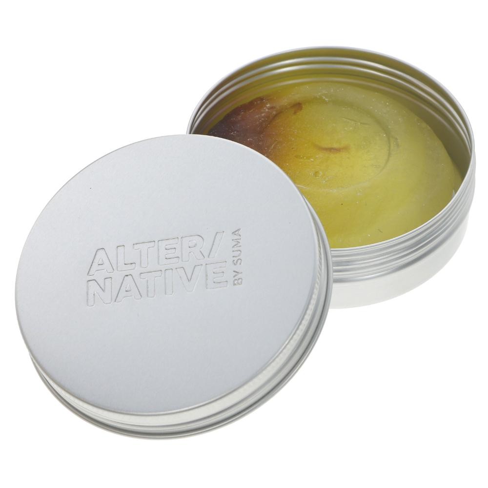 An open, round aluminium round soap tin on a white background showing a soap in the tin and the lid with 'Alter/native by Suma' branding