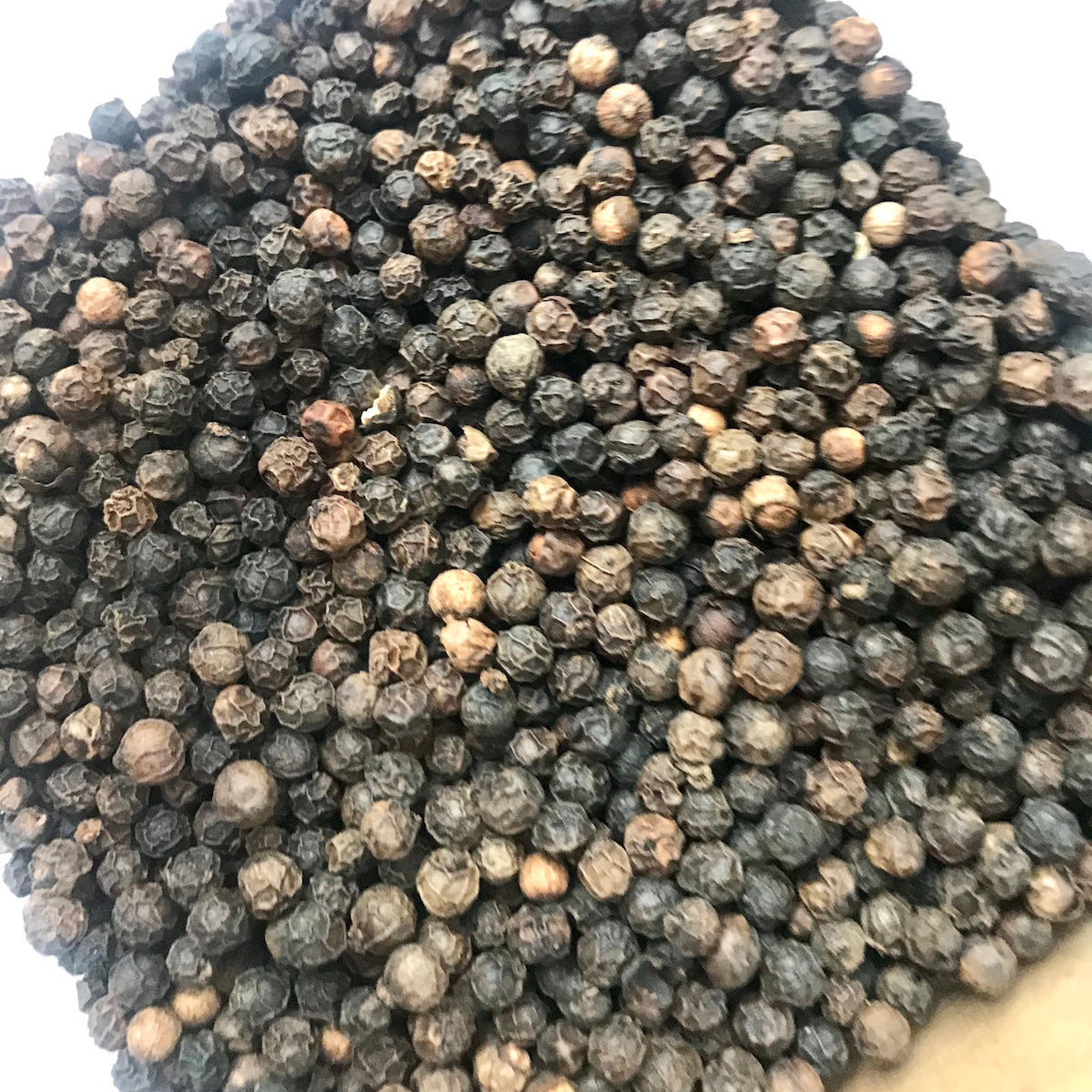 whole black peppercorns