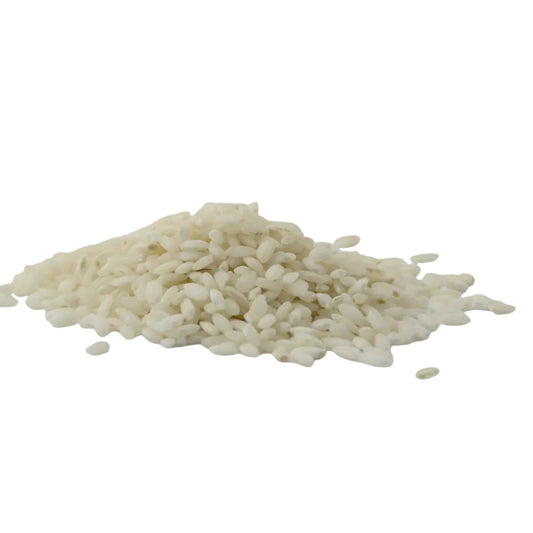 Pile of white rice on a white  background