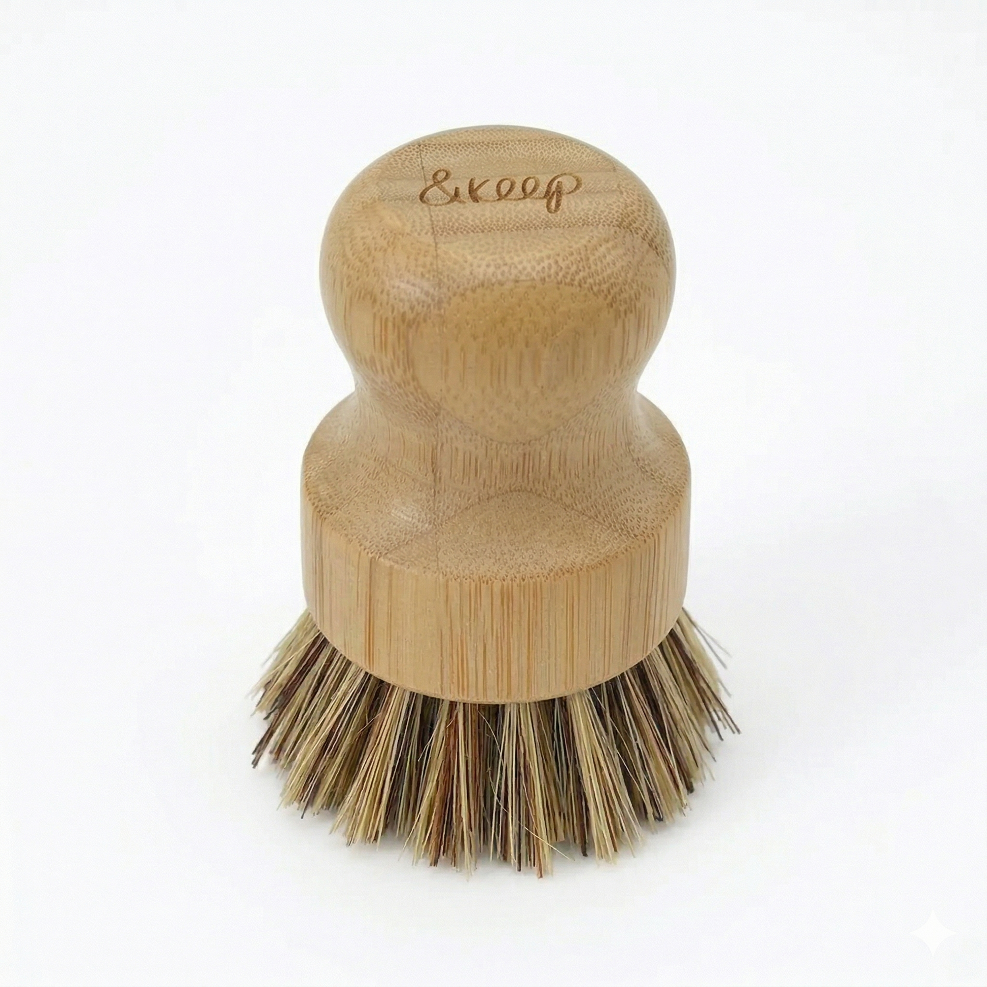 Wooden dish brush with firm bristles on a white background