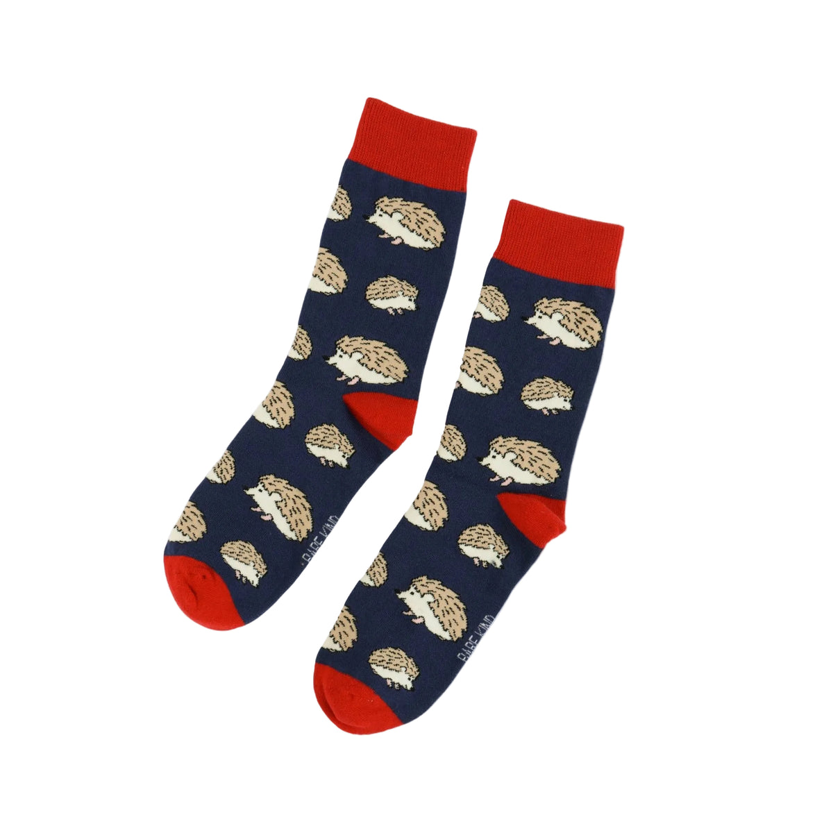 A pair of navy blue crew socks with a repeating hedgehog pattern, featuring bright red cuffs, heels, and toes, displayed on a clean white background.