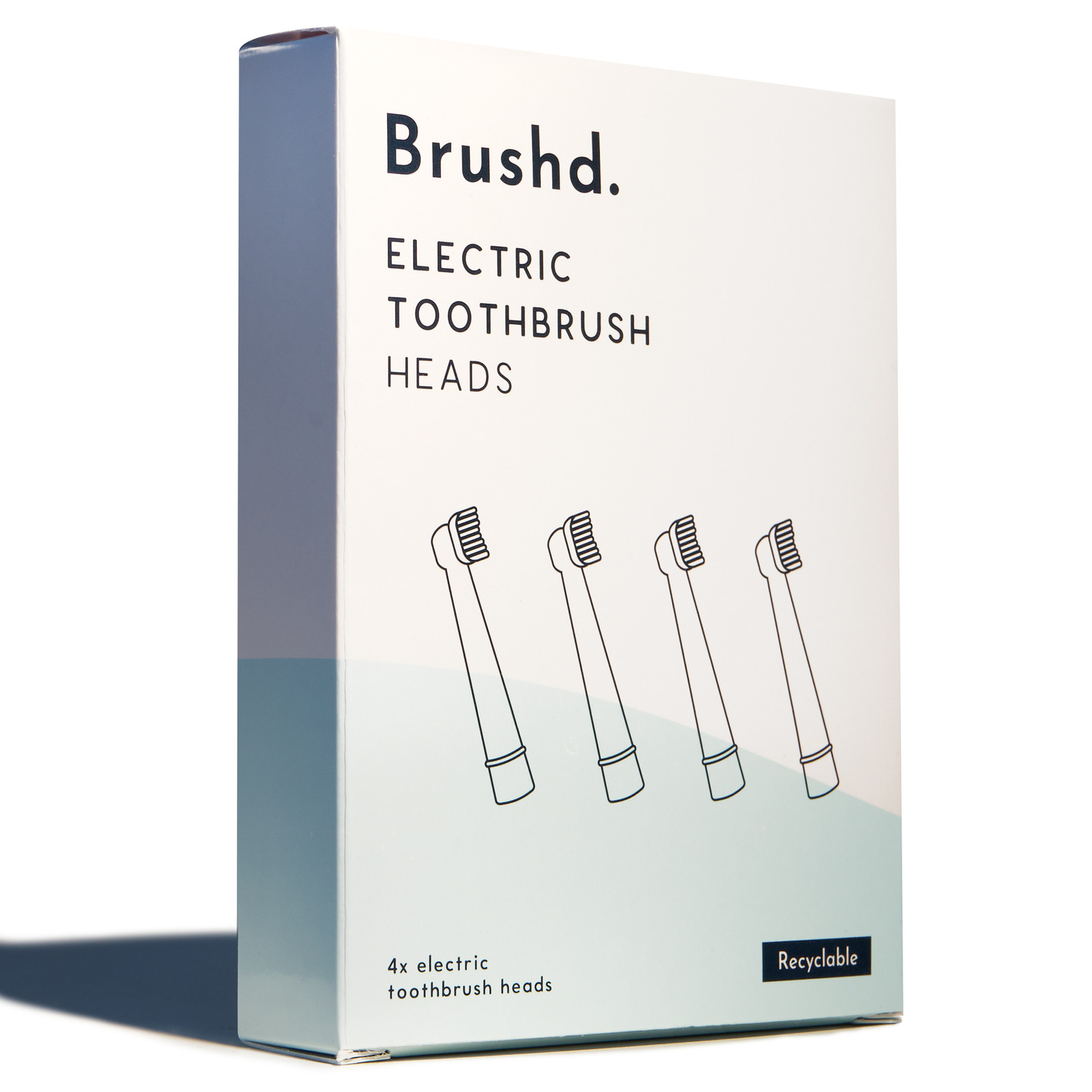 Cardboard box of Brushd 4 replacement standard heads for a Oral B electric toothbrush with a freepost sticker for returning the heads for recycling 