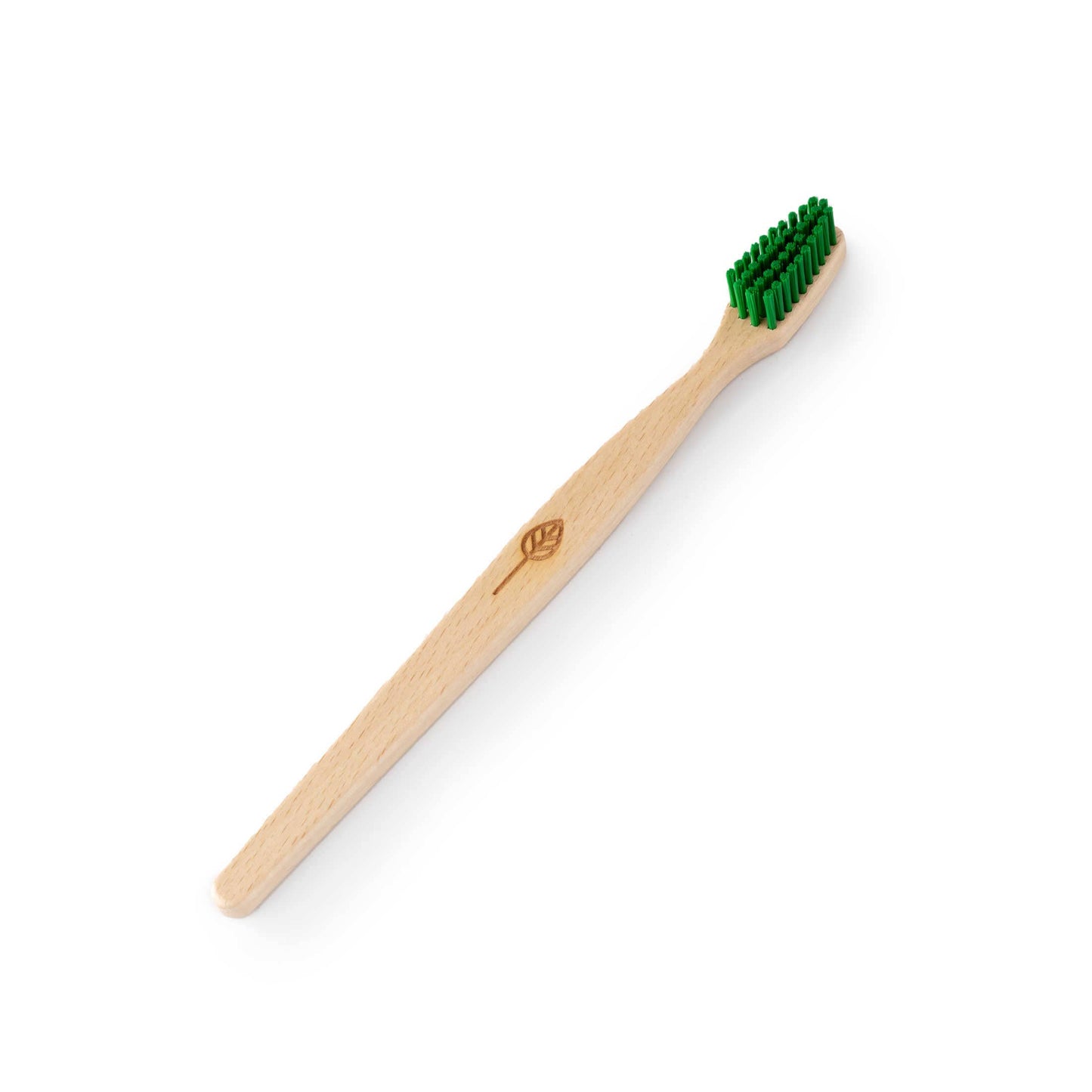 A single beechwood toothbrush with green castor oil bristles and a small leaf logo engraved on the handle, shown diagonally on a clean white background.