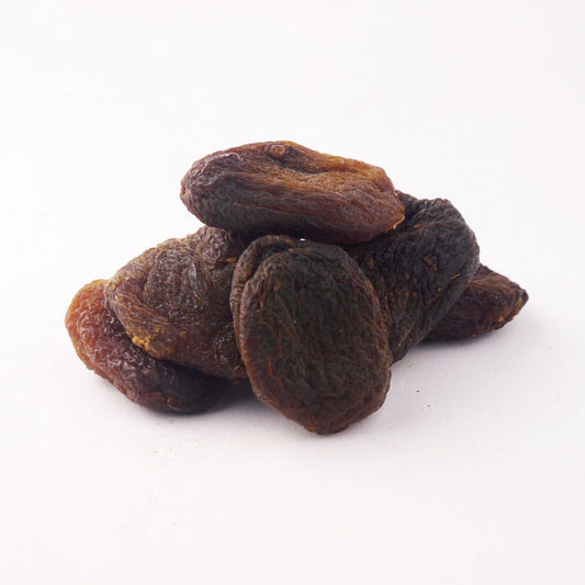 Dried apricots on a white background