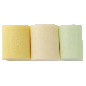 A row of 3 different coloured, unpackaged  soap bars on a white background. 