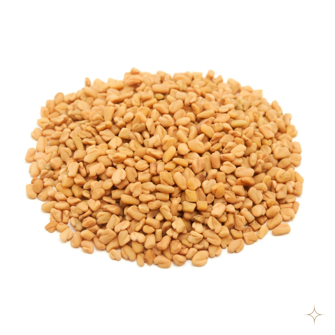 A pile of roasted fenugreek seeds on a plain white background.