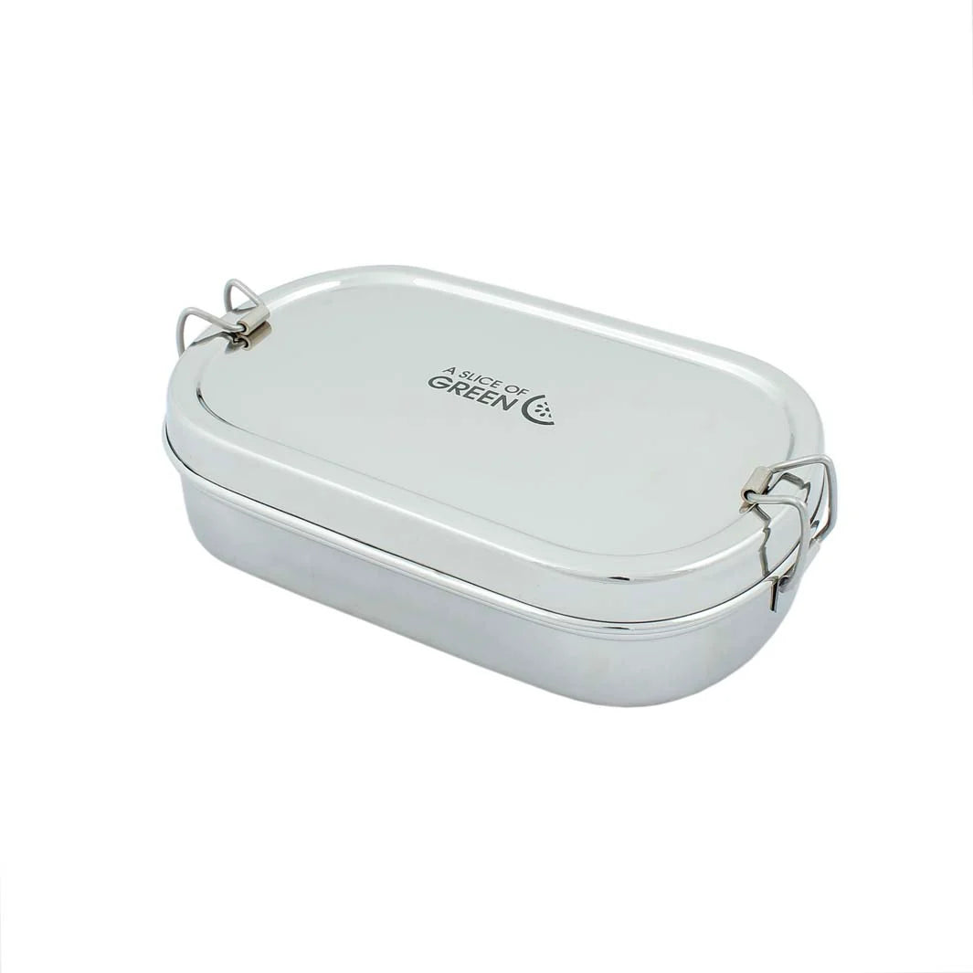 A stainless steel lunch box with a lid, featuring two metal latch clasps on the sides and the 'A SLICE OF GREEN' logo printed on the top surface, set against a plain white background.