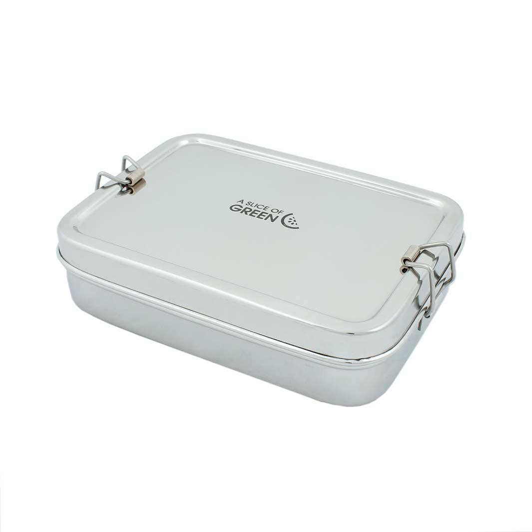 A rectangular stainless steel lunch box with a hinged lid, featuring the 'A Slice of Green' logo printed on the lid, set against a plain white background.