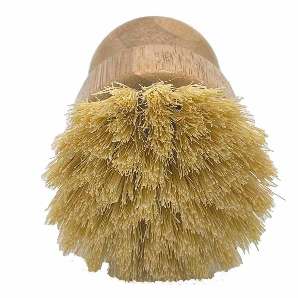 A natural bamboo-handled pot brush with dense, soft golden-yellow bristles, shown against a plain white background.