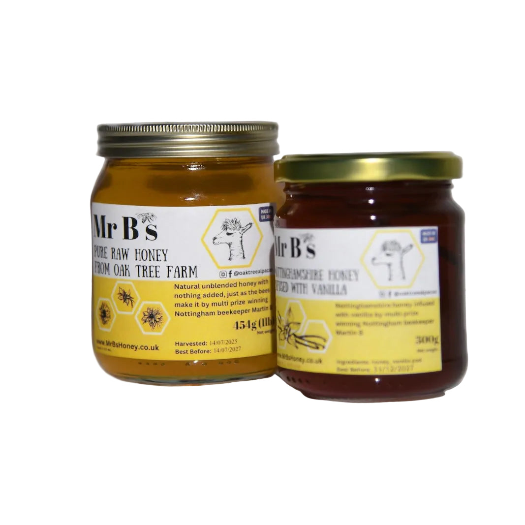 Two jars of Mr B's honey from Oak Tree Farm on a white background