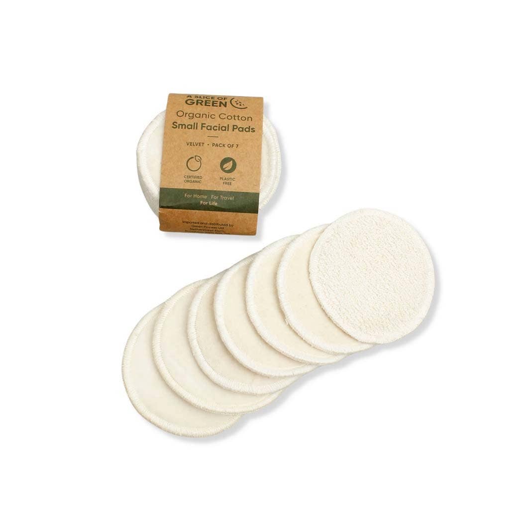 Set of 7 organic cotton facial pads with packaging on a white background
