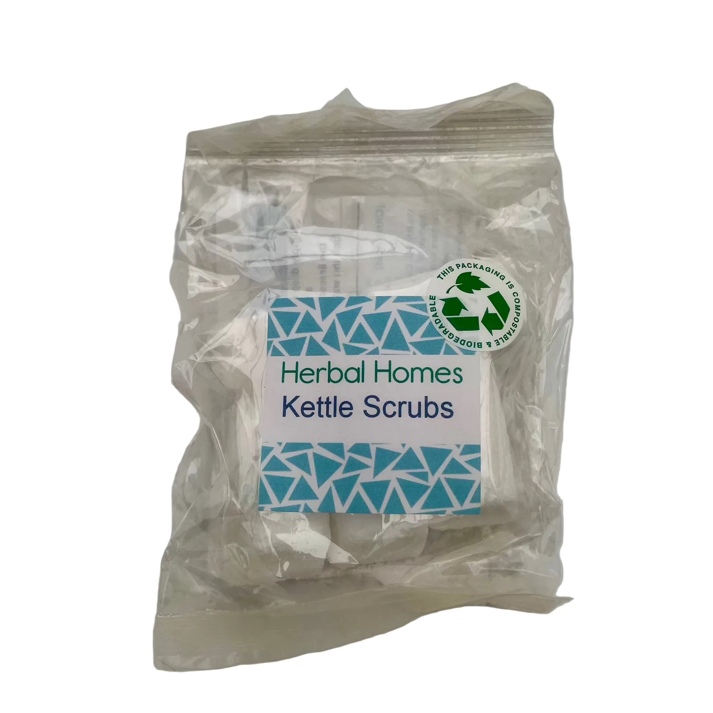 A sealed compostable packet with a Herbal Homes Kettle Scrubs white label containing 5 kettle scrubs for naturally descaling a kettle.