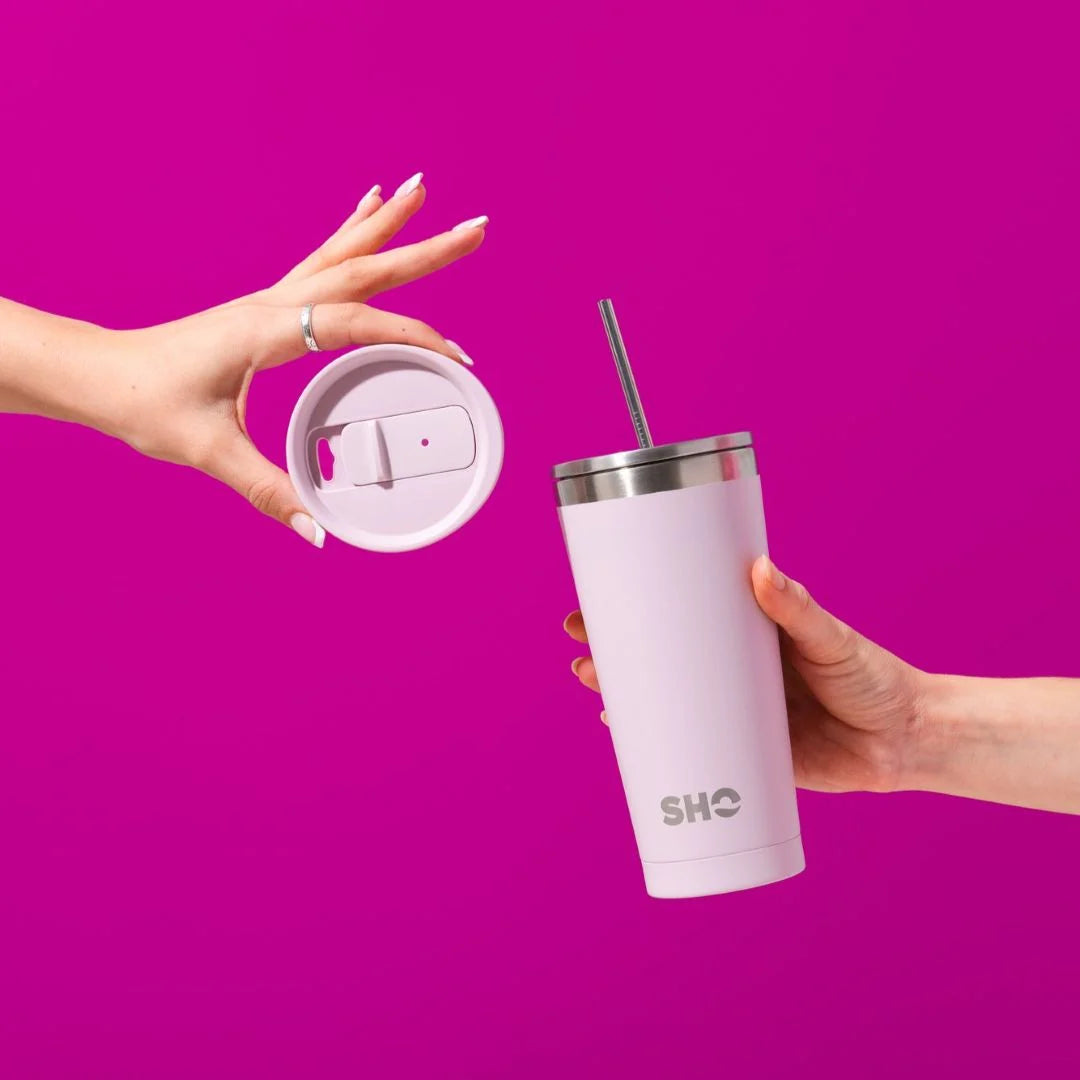 Calix insulated 500ml reusable cup in pale lavender colour with a straw lid and showing the 2nd slider lid