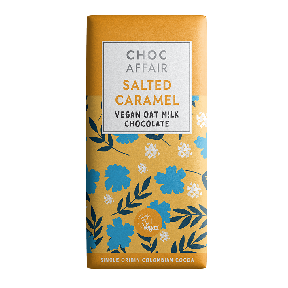 Choc Affair Salted Caramel Vegan Oat Milk Chocolate bar in a rectangular wrapper with a mustard yellow background, blue and white floral pattern, and a white label at the top.