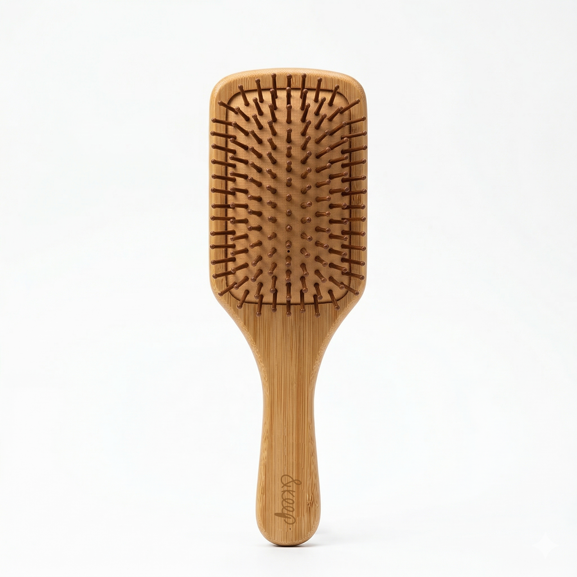 Wooden hairbrush on a white background