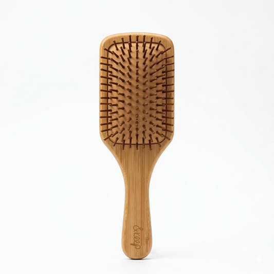Wooden hairbrush on a white background