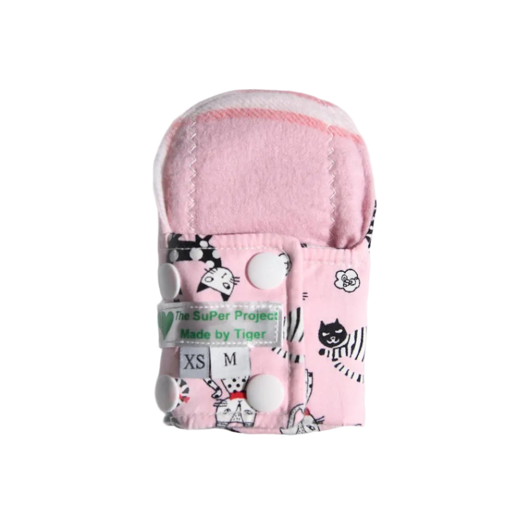 Pink cotton reusable period pad with cute cat pattern. 